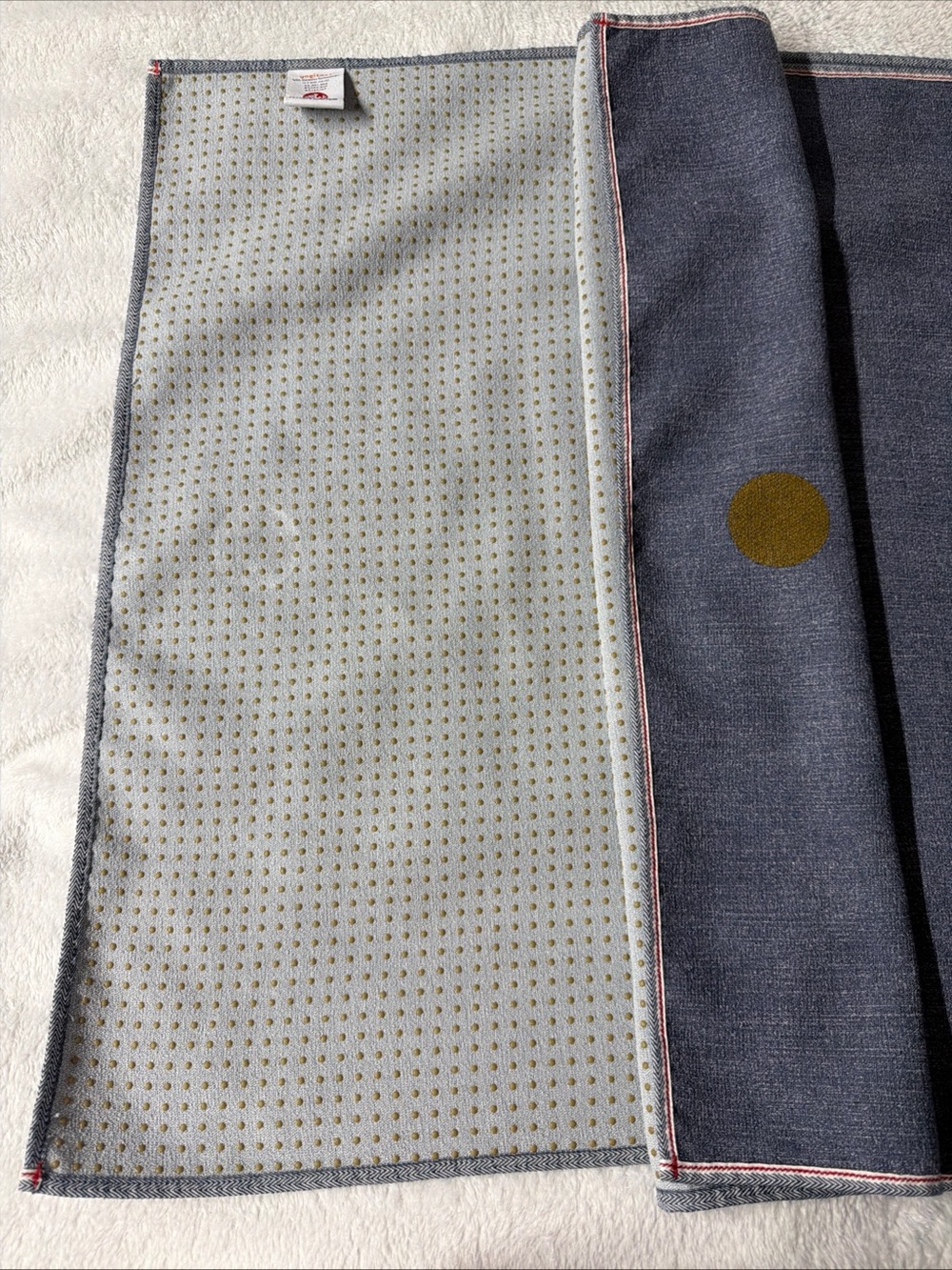 manduka yoga grip mat  in gray and yellow skidless